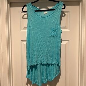 Tresics is high low tunic tank in turquoise.  Size L